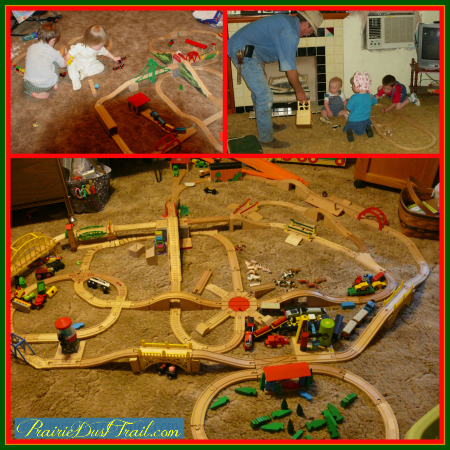 Playing trains with Grandpa. We love wooden train sets!